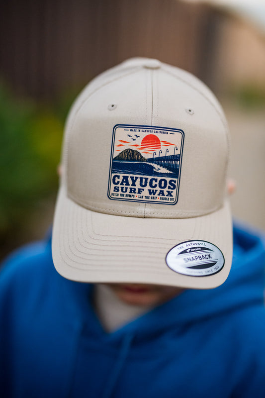 Khaki Cayucos Surf Wax Classic trucker hat with embroidered logo.