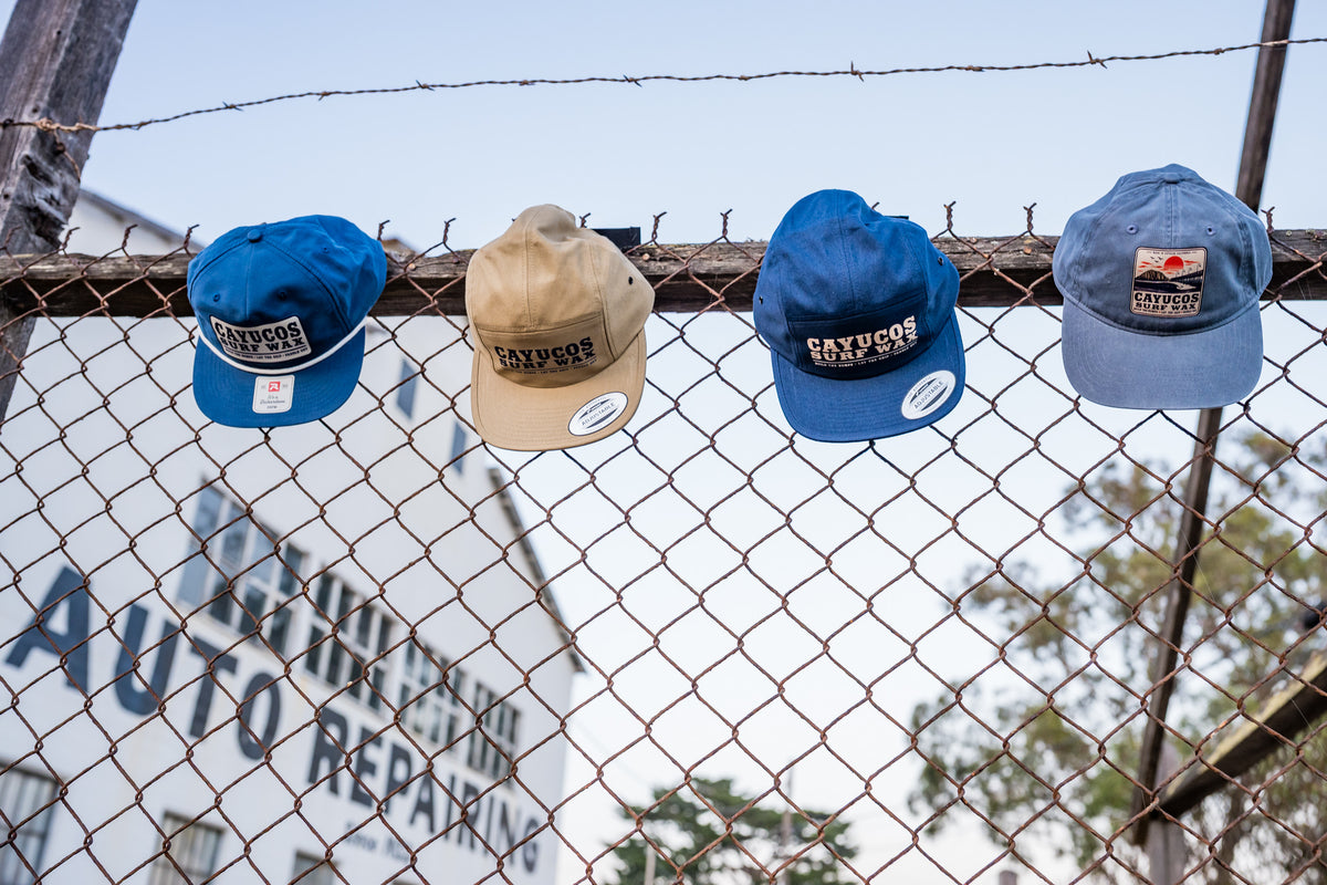 Cayucos Surf Wax Fall Hat collection photographed at Borradori Garage